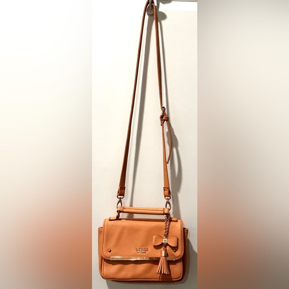 GUESS Peach Saffiano Crossbody Top Handle Bag w/ Bow Tassel & Long Strap - Picture 5 of 16
